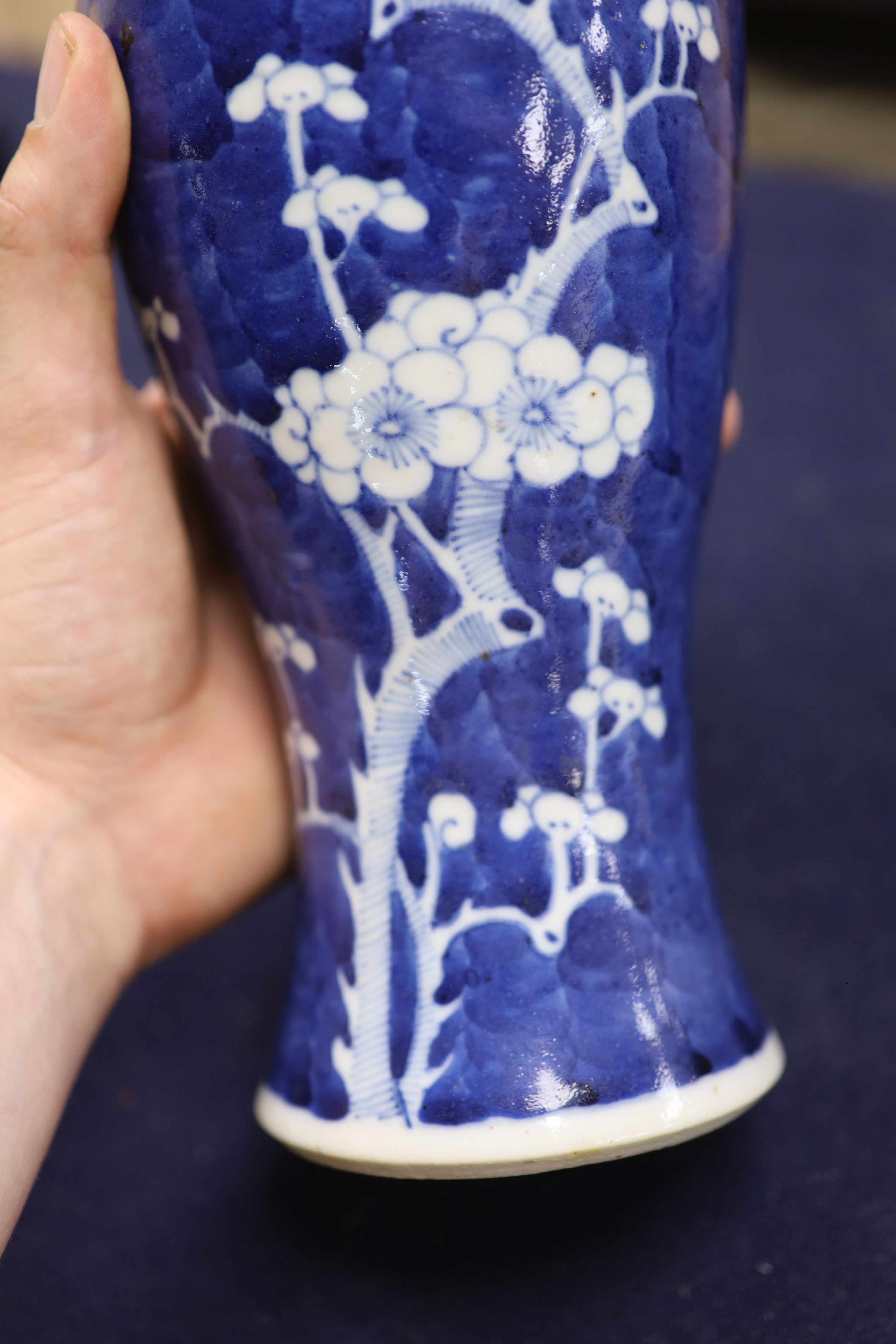 A pair of slender Chinese blue and white prunus vases, late 19th century, height 30cm